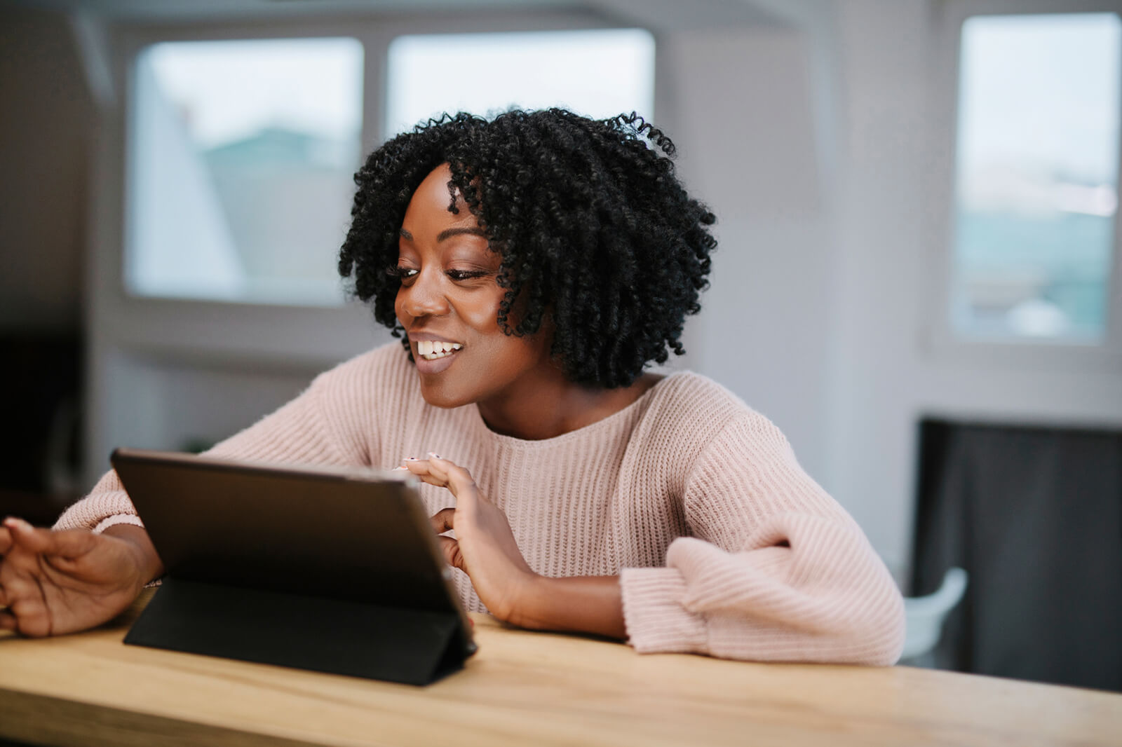 woman giving an online presentation with slido