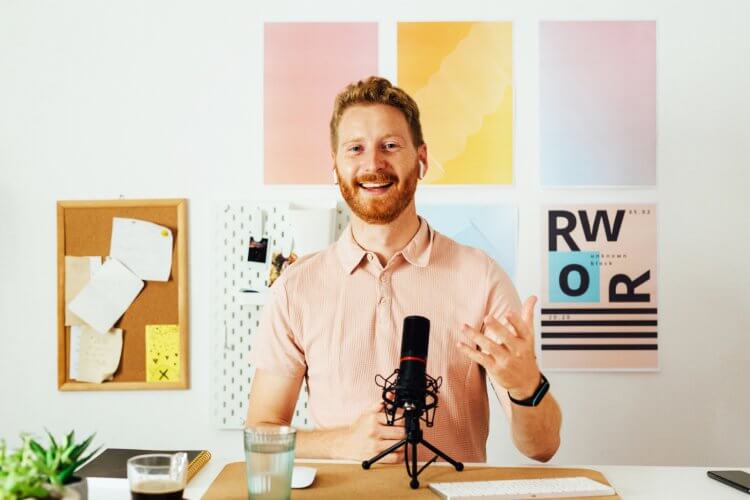 a young man doing a training online depicted on a header image for Slido blog